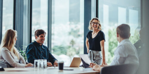 Business people having casual discussion during meeting