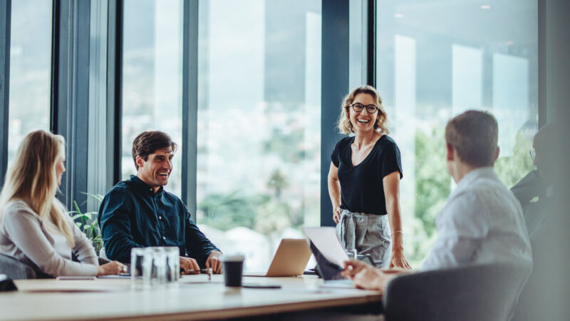 Business people having casual discussion during meeting